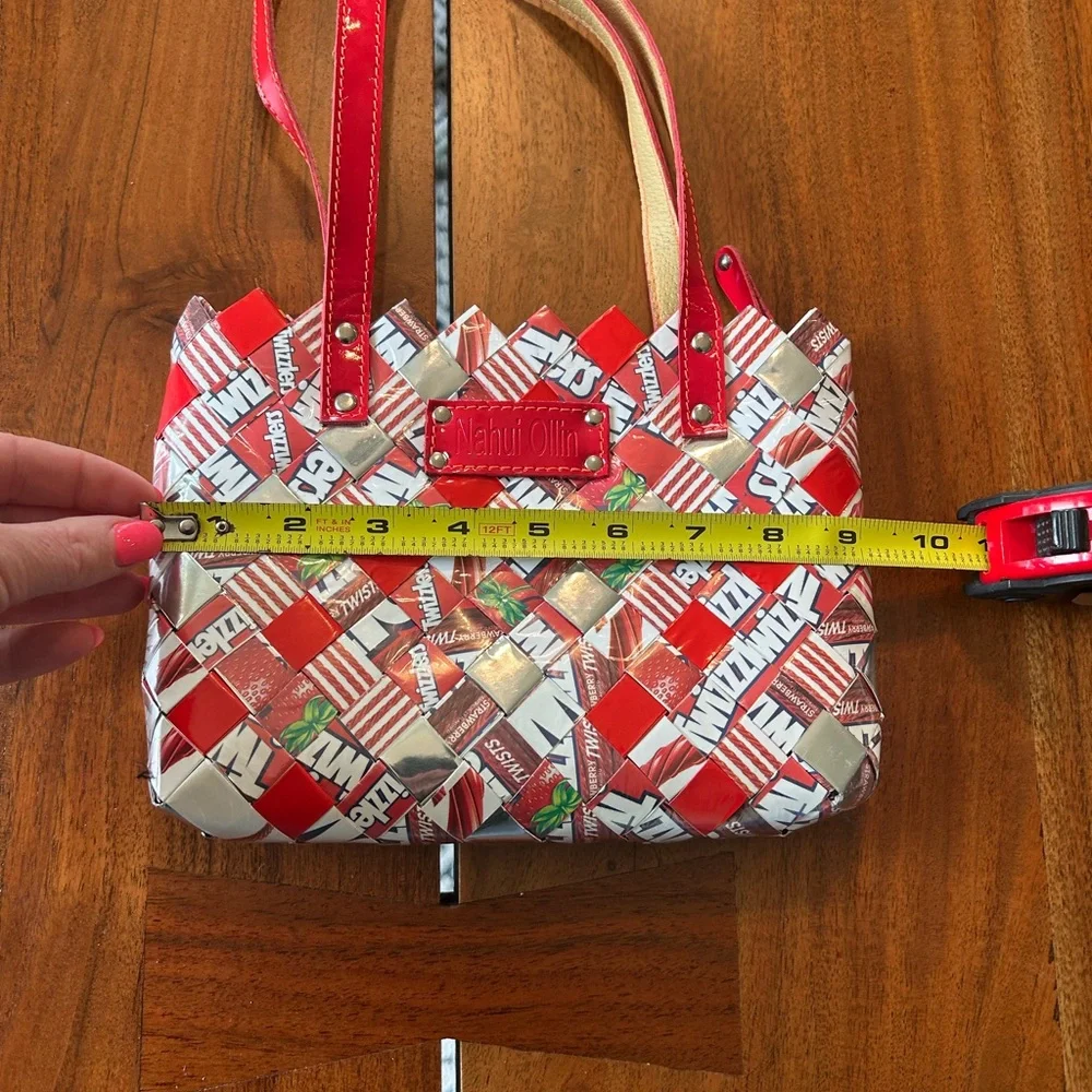 Nahui Ollin Red Twizzler bag